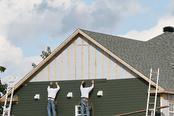 Professional Emergency Siding Repair technician working in Lake Milton, OH